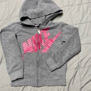 Gray and Pink Nike Zipp up hoodie.